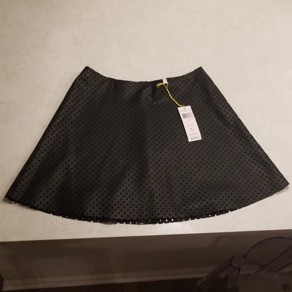 Black BCBG mini skirt (faux leather)